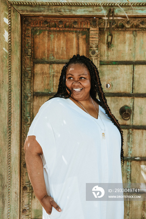 plus size afro latinx haitian american woman smiling outside