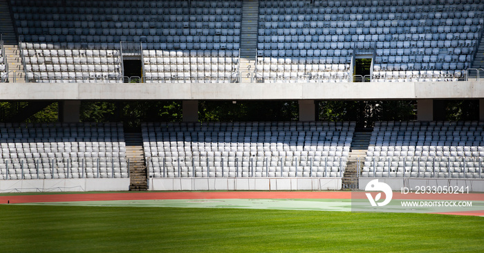 Soccer stadium with empty seats.