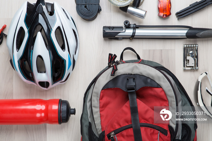 Cyclist accessories on wooden background