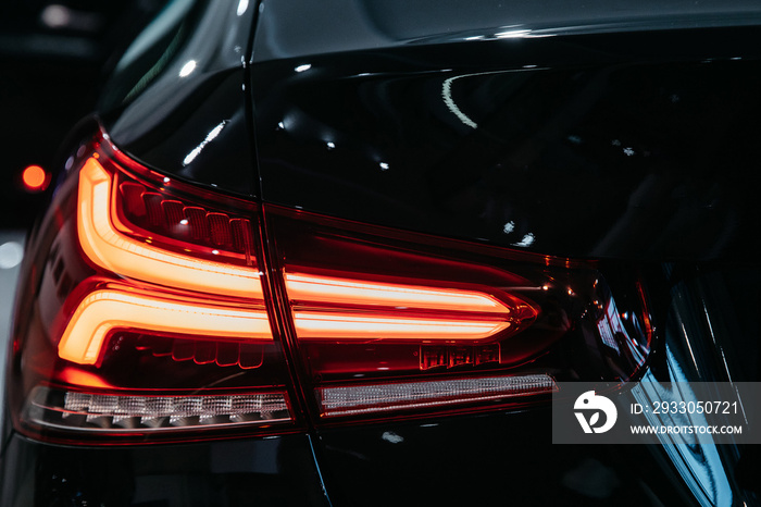 Detail on the rear light of a car. Car’s rear brake light