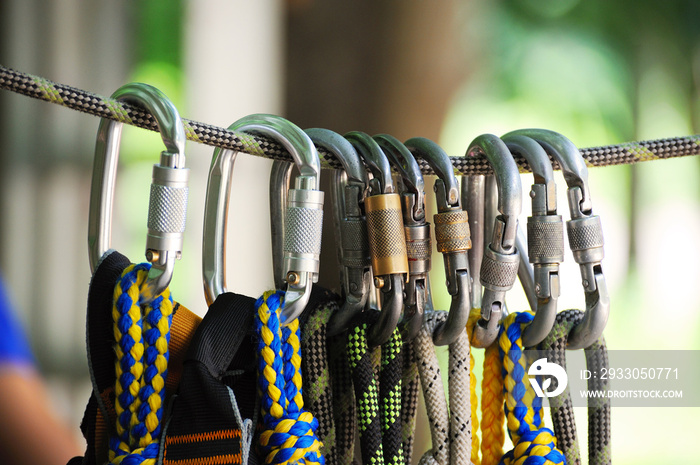 Climbing sports image of a carabiner on a rope