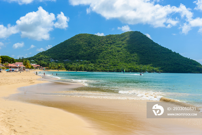 Reduit Beach - Tropical coast on the Caribbean island of St. Lucia. It is a paradise destination with a white sand beach and turquoiuse sea.