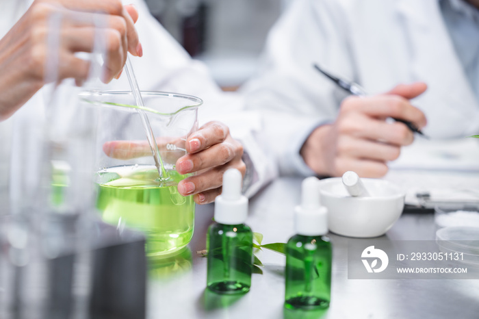 pharmaceutical science laboratory of health care cosmetic research, apothecary scientist working to test a organic herb drug of chemical medicine experiment with chemist doctor, beaker glasses tools