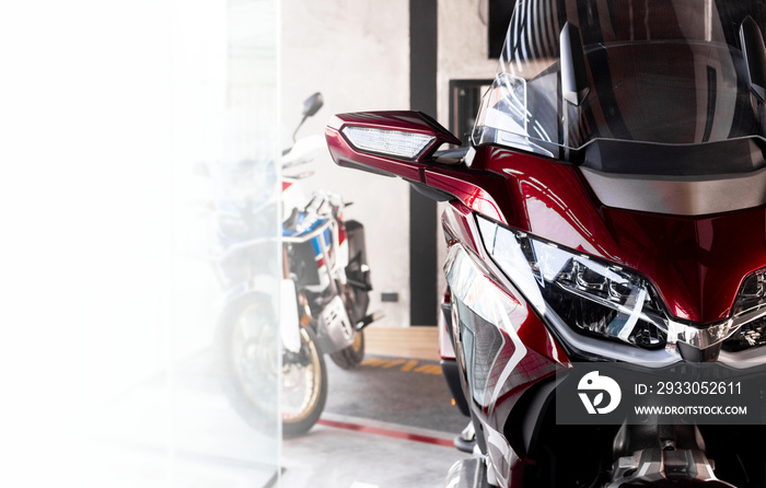 motorcycle bigbike in showroom with soft-focus and over light in the background