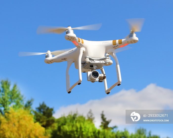 Drone quadrocopter with high resolution digital camera. New tool for aerial photo and video.