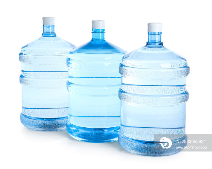 Bottles of clean water on white background