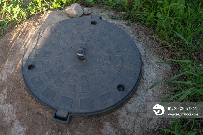 Black plastic septic tank manhole