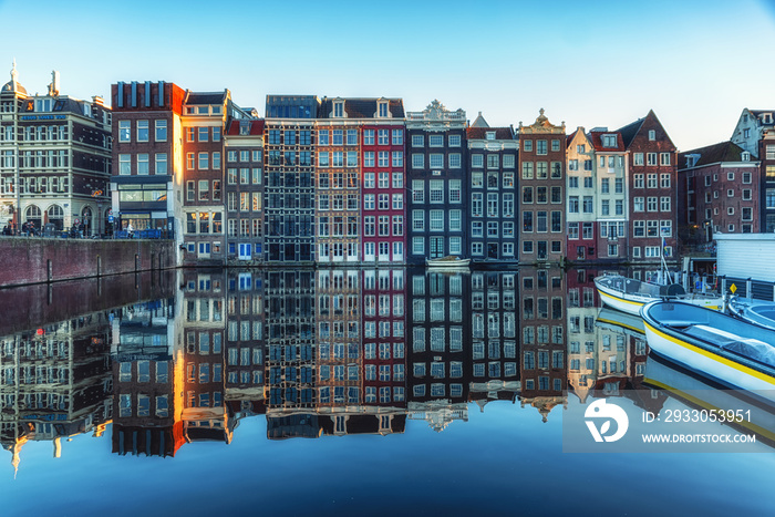 Amsterdam City Scene,  typical dutch houses and their reflection in the canal.