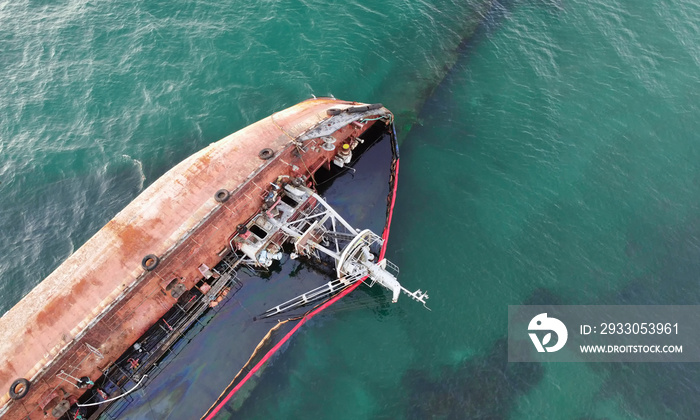 A sunken tanker that hit the shore with a storm. Coastal pollution by oil. Ecological catastrophe.