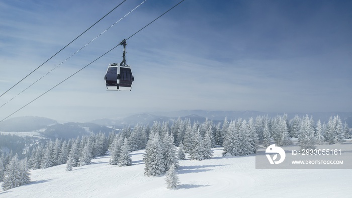 Cabin lift in a ski and snowboard paradise above the winter slope