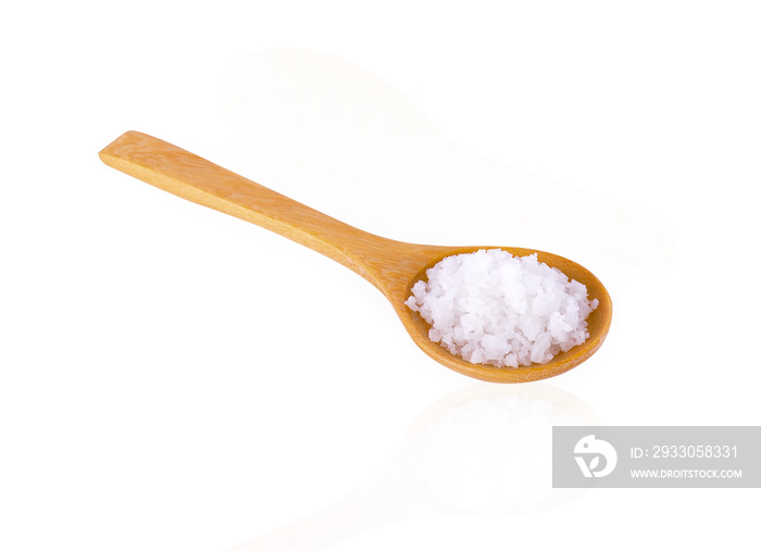 Teaspoon salt on white background