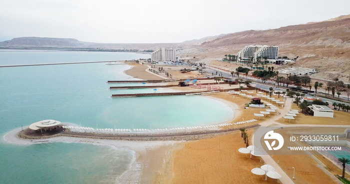 Aerial image  of the Dead Sea in israel. POV from the sea to hotels and to the mountains.