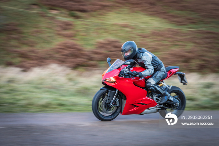 Panning Motorbike at Speed / Panning motorbike at speed to create motion blur on a country road in Upper Coquetdale, Northumberland