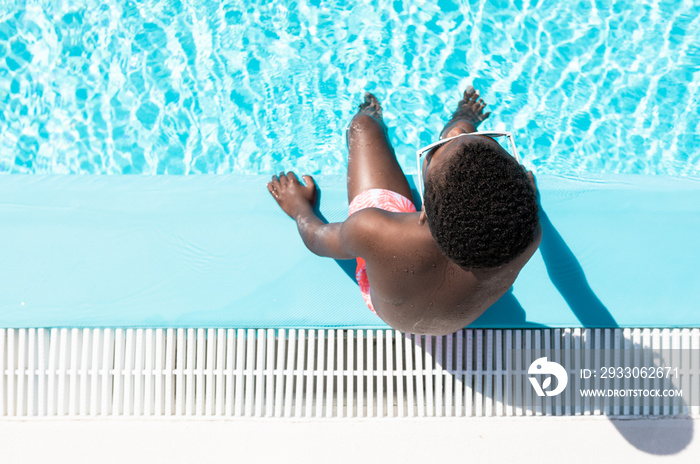 black child in the pool