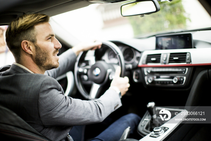 Young man in the car