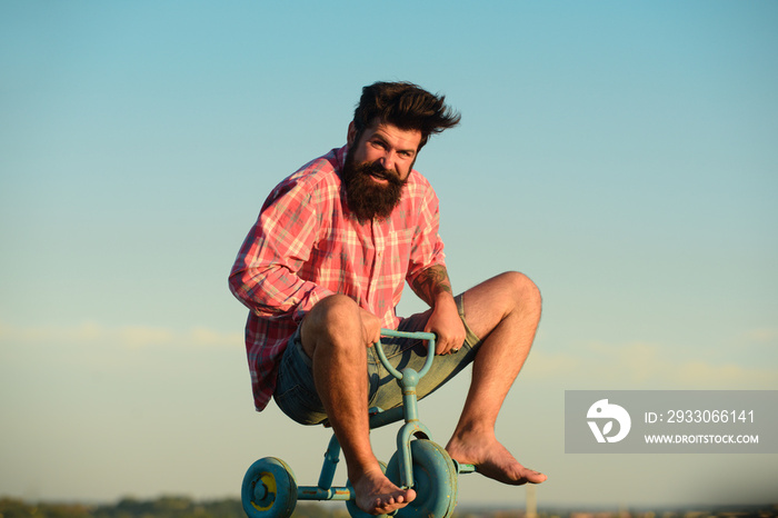 Funny crazy man bicyclist riding a bike.