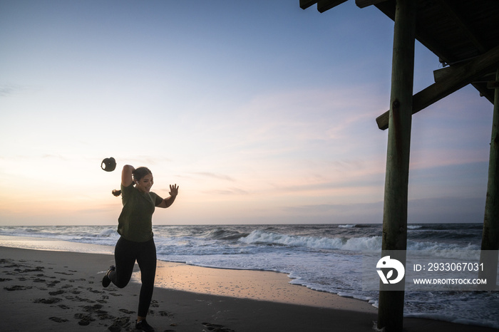 Marine veteran trains every morning on the beach to stay in shape just like when she was on active duty.