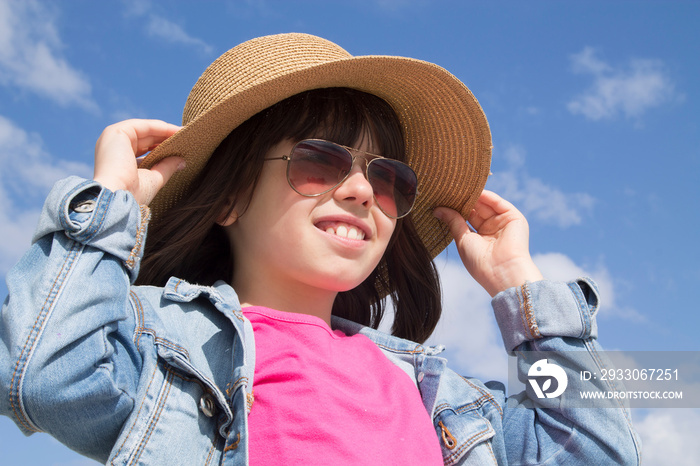 portrait of girl with hat and sunglasses