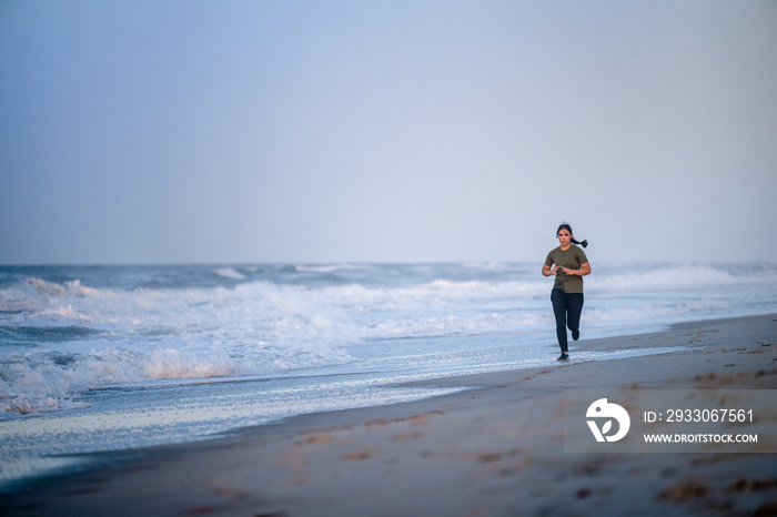 Marine veteran trains every morning on the beach to stay in shape just like when she was on active duty.