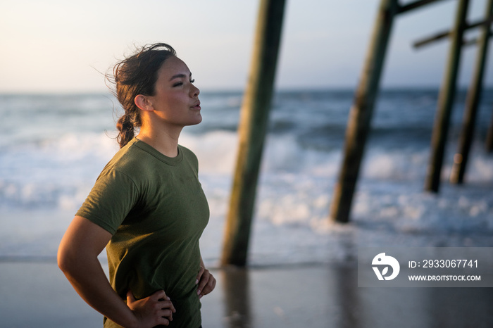 Marine veteran trains every morning on the beach to stay in shape just like when she was on active duty.