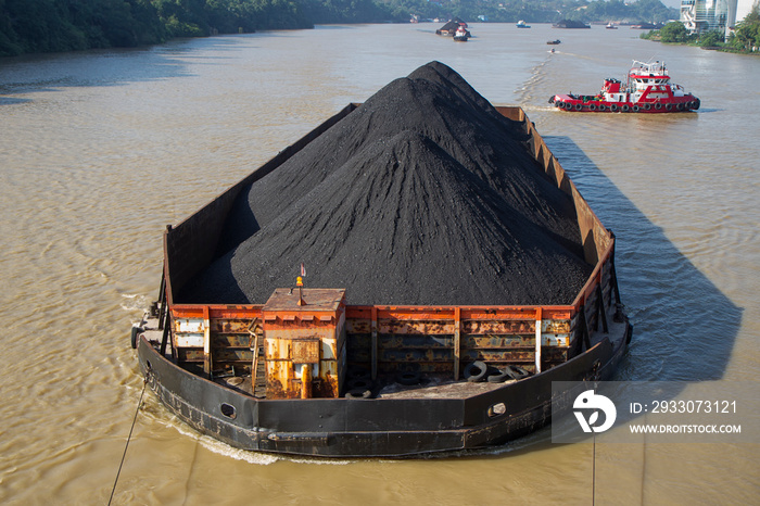 coal transported by the barges on Mahakam river, Samarinda, East Kalimantan, Indonesia