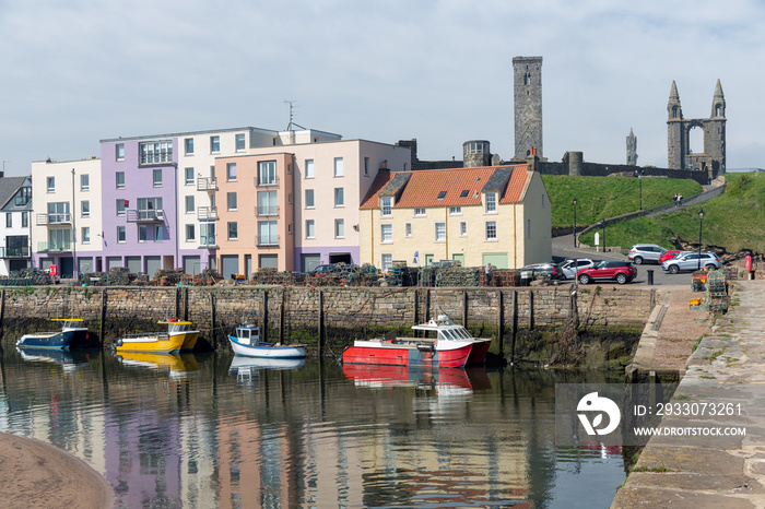 Harbor with fishing ships and skyline with ruin cathedral St Andrews, Scotland