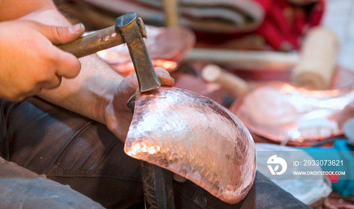 Copper master, Hands detail of craftsman at work - ISFAHAN, IRAN