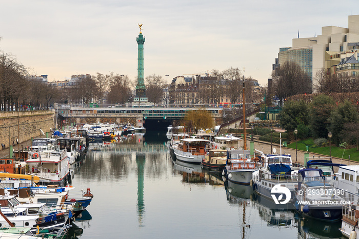 View of the harbor and monument at La Bastille in Paris, France