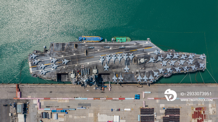 Navy Nuclear Aircraft carrier, Military navy ship carrier full loading fighter jet aircraft, Aerial view.