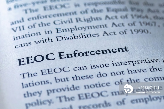 legal or law book with EEOC Enforcement focused in closeup of explanation equal employment opportunity commission