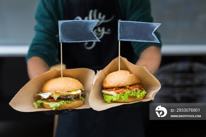 Street fast food, hamburgers with bbq grilled steak