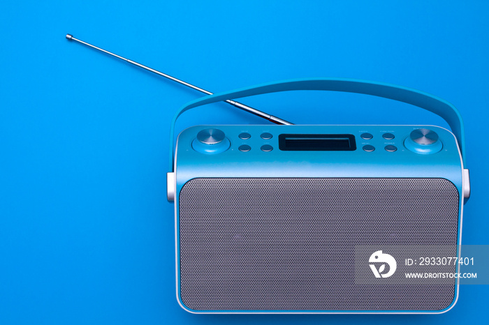 Top view on new digital blue radio,which it is stylized art retro style radio.