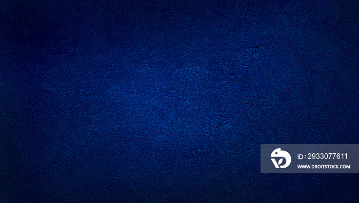 blank blue texture surface background with dark corners. blue grainy cement wall background with space for text.