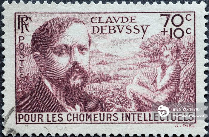 rance - circa 1939: A postage stamp from France showing a portrait of the composer Claude Debussy. For the unemployed intellectuals.