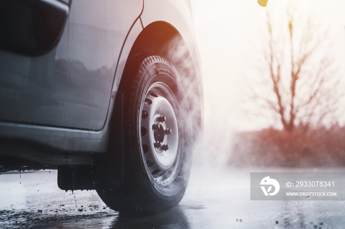 Car Wash detail. Vehicle During Washing Process. Manual washing wheels from the outside.