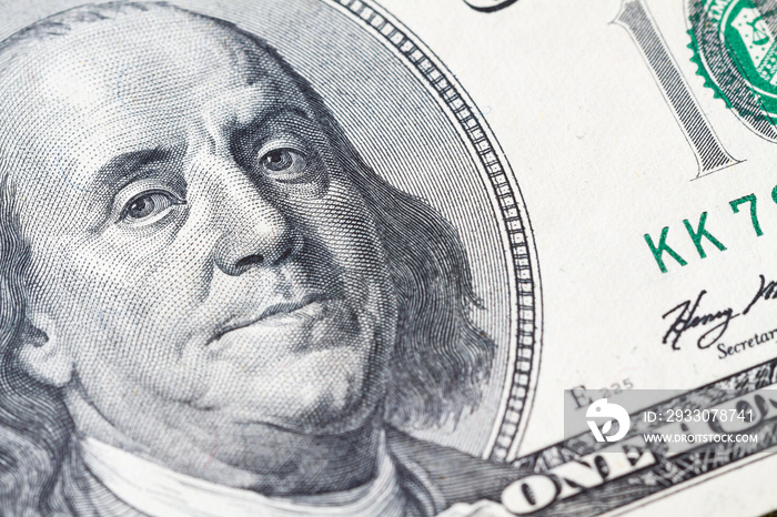 Macro close up of Ben Franklin’s face on the US $100 dollar bill.