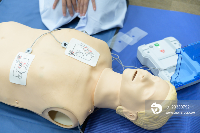 Demonstrating Automated External Defibrillator, AED technic .Doctor and nurse students are learning how to rescue the patient.First aid for safe life concept.