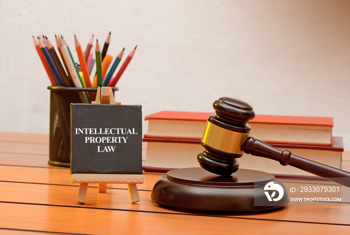 Intellectual property law conceptual photo with books in background