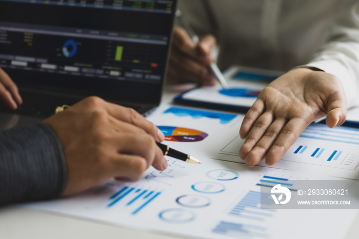 Meeting businessman and financial expert discussing analysis business report graph and finance budget chart in the office. Concept of finance economy, banking business and stock market research.