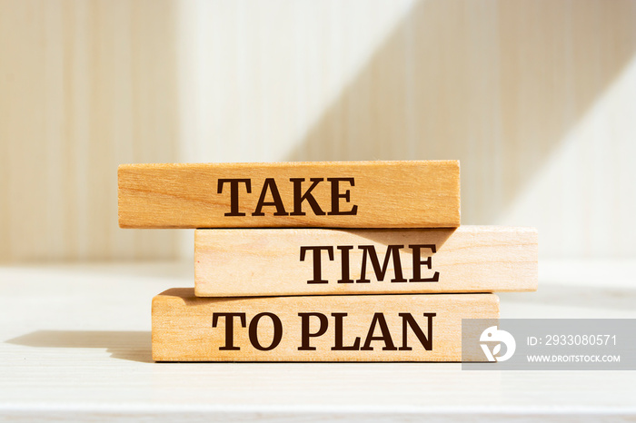 Wooden blocks with words ’Take time to plan’. Business concept