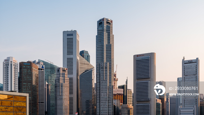 Singapore city CBD skyline at Marina Bay during sunset and golden hour