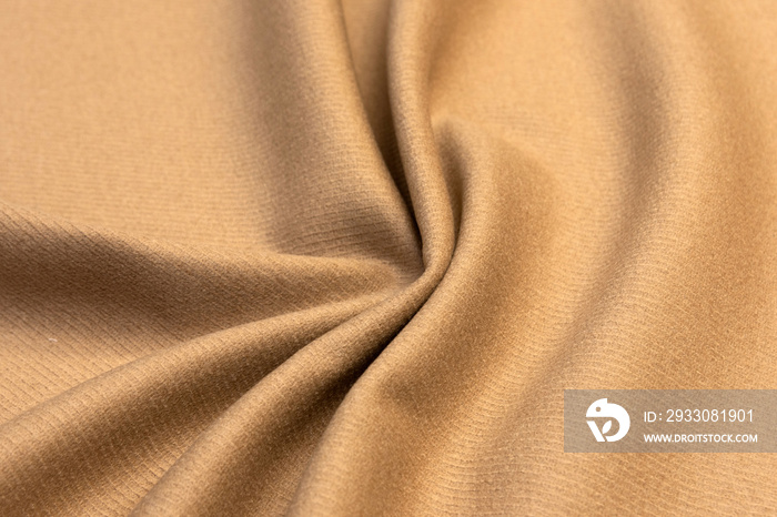 Expensive velour beige fabric, cashmere textile, velvet suede and chamois effect, cotton upholstery, synthetic materials, polyester fiber.