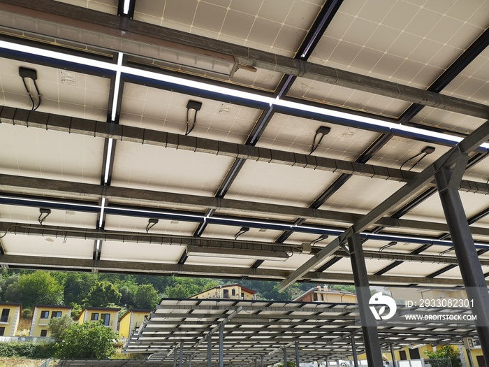 parking spaces covered with solar panels at the shopping center