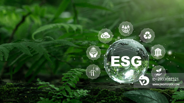 ESG icon concept on tcrystal globe for environmental, social, and governance in sustainable and ethical business on the Network connection on a green background.