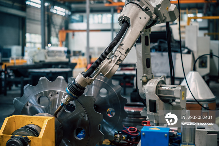 robot arm working in factory