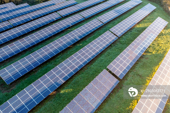 Aerial view of solar panels on farmland generating clean and renewable electricity