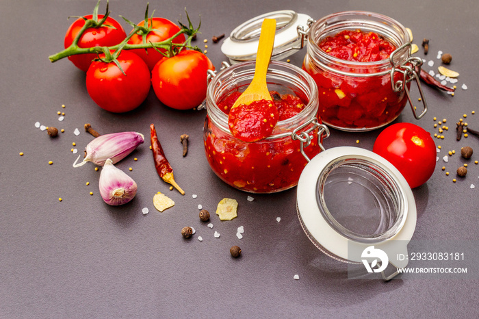 Tomato confiture, jam, chutney, sauce. Homemade preservation concept