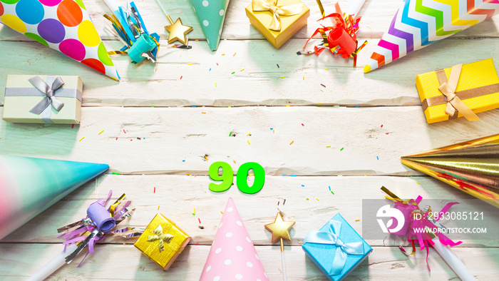 Beautiful colorful greeting card on the background of white boards happy birthday copy space. Beautiful ornaments and decorations festive background. Happy birthday number 90