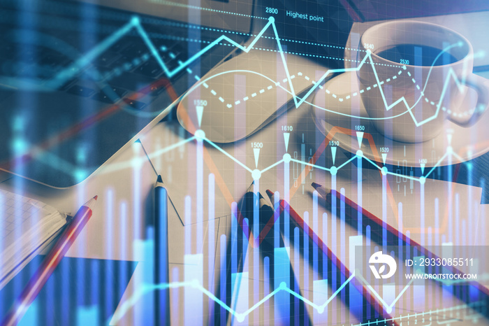 Financial graph colorful drawing and table with computer on background. Double exposure. Concept of international markets.