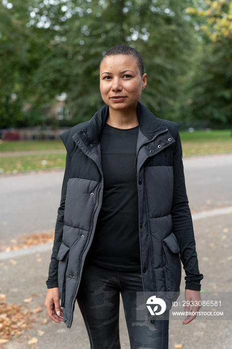 Portrait of woman in sports clothing in park